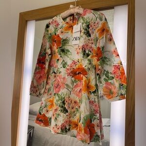 Zara the Naya mini dress open back , long sleeves brand new with tags .